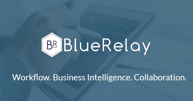 Image of a hand with a tablet stylus, tapping against a tablet screen