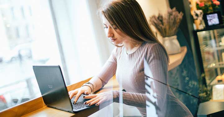 Woman working at desk from home